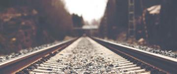 Photo of empty railroad tracks during the day